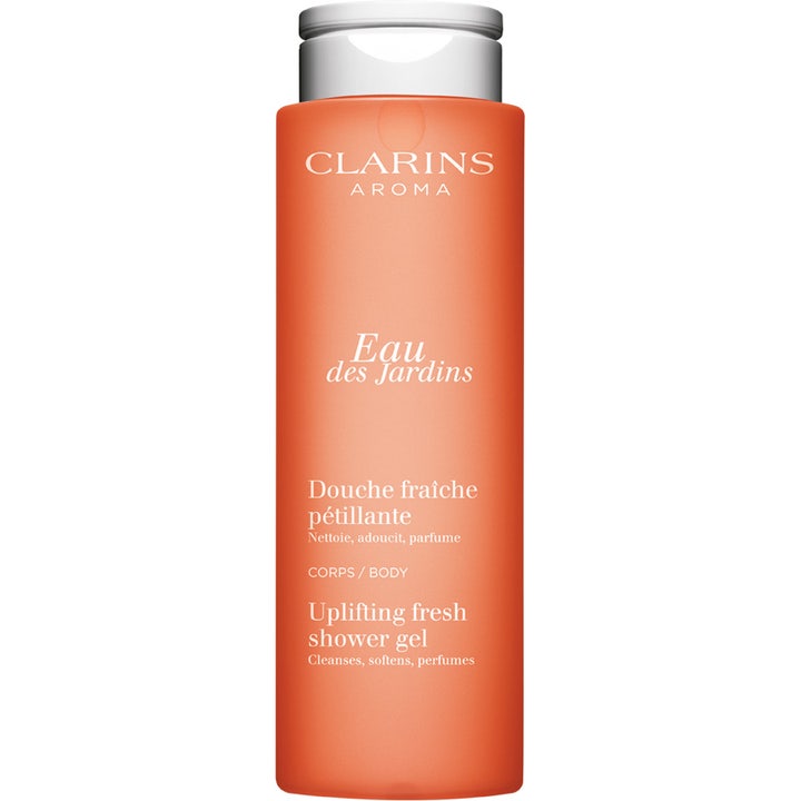 Clarins Eau des Jardins 200ml uppfriskande naturlig duschtvål i en färgstark orange flaska med silverfärgat lock.