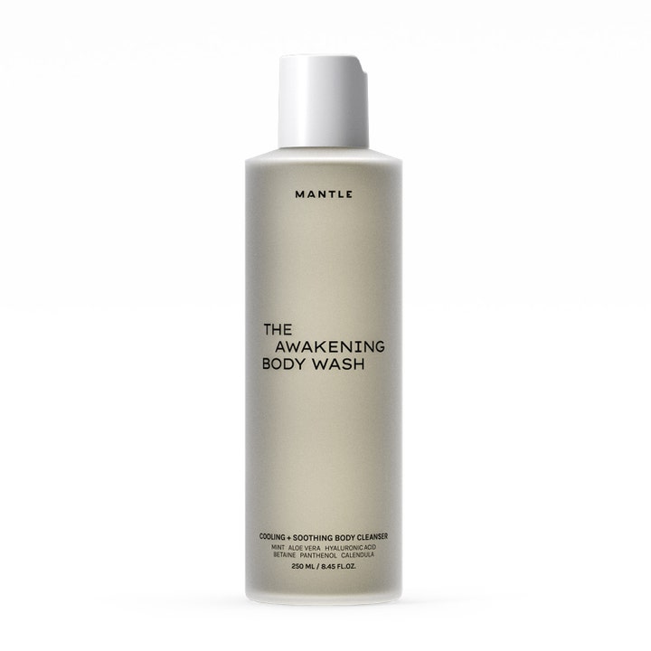 Mantle The Awakening Body Wash 250 ml svalkande duschkräm med panthenol i en stilren frostad flaska med vitt lock.