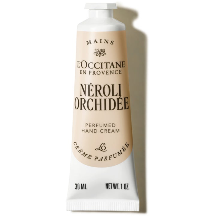 L'Occitane Néroli & Orchidée 30 ml parfymerad handkräm som ger näring i en stilren beige och vit tub med vitt lock