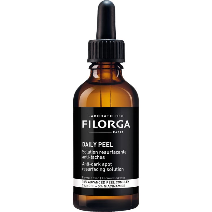 Filorga Daily Peel exfolierande ansiktsserum med niacinamid motverkar fläckar i brun glasflaska med pipett.
