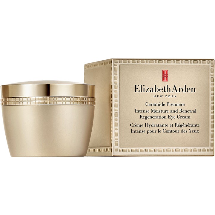 Elizabeth Arden Ceramide Premiere anti-aging ögonkräm i guldfärgad burk med texturerad kant bredvid sin guldiga ask