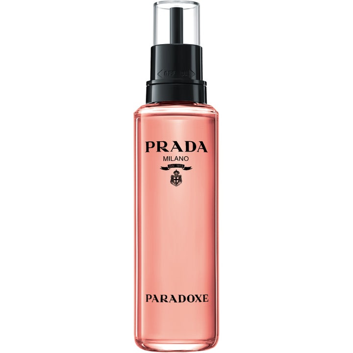 Prada Paradoxe EdP Refill 100 ml prada parfym refill i en hög flaska med rosa vätska och svart munstycke som ger ny parfym