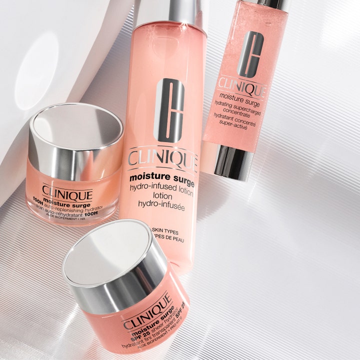 Clinique Moisture Surge SPF25 Sheer Hydrator 30 ml dagkräm med solskydd i persikofärgad burk med silverlock.