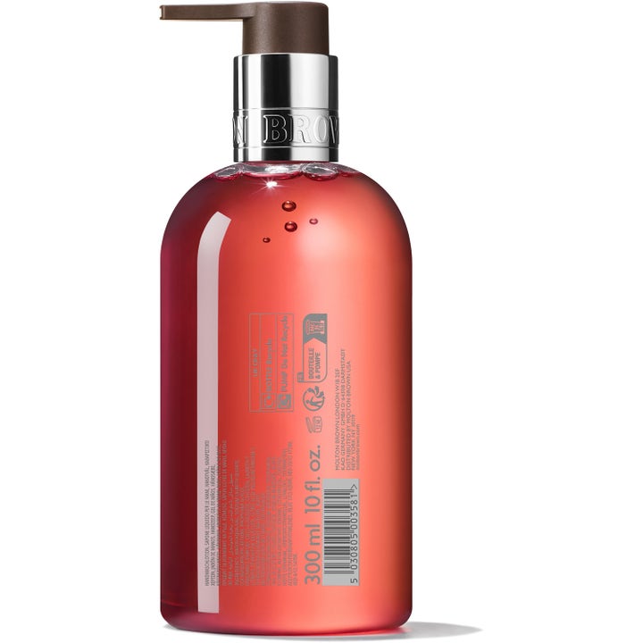 Molton Brown Heavenly Gingerlily Hand Wash 300 ml lyxig handtvål i genomskinlig flaska med silverdetaljer sedd bakifrån
