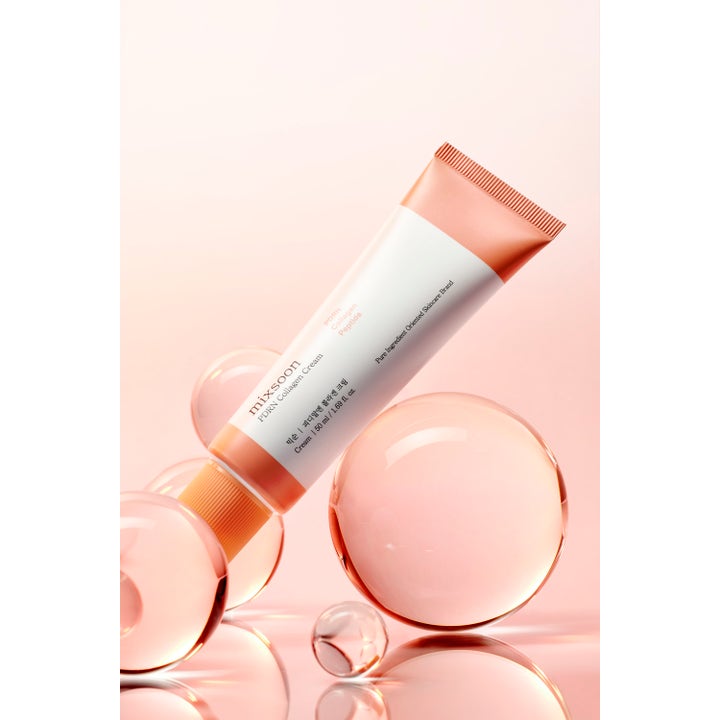 Mixsoon PDRN Collagen Cream 50 ml återfuktande ansiktskräm i persikofärgad tub bland glasklara bubblor