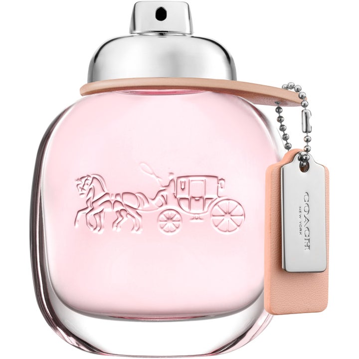 COACH Coach Eau de Toilette 50 ml parfym i rundad glasflaska med rosa vätska och silverfärgat sprayhuvud med läderdetalj