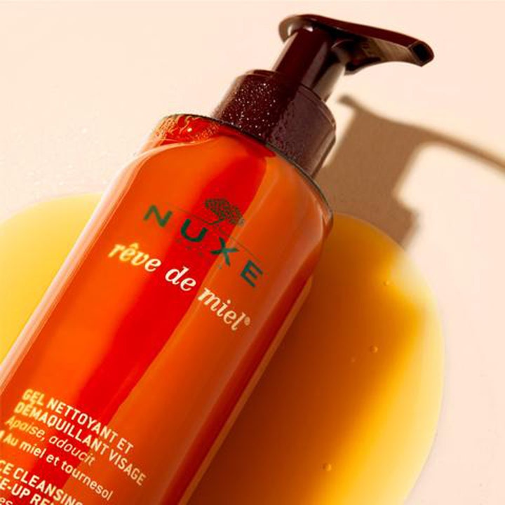 Nuxe Rêve de Miel 200 ml lugnande rengöringsgel i bärnstensfärgad pumpflaska med fyllig honungsliknande textur
