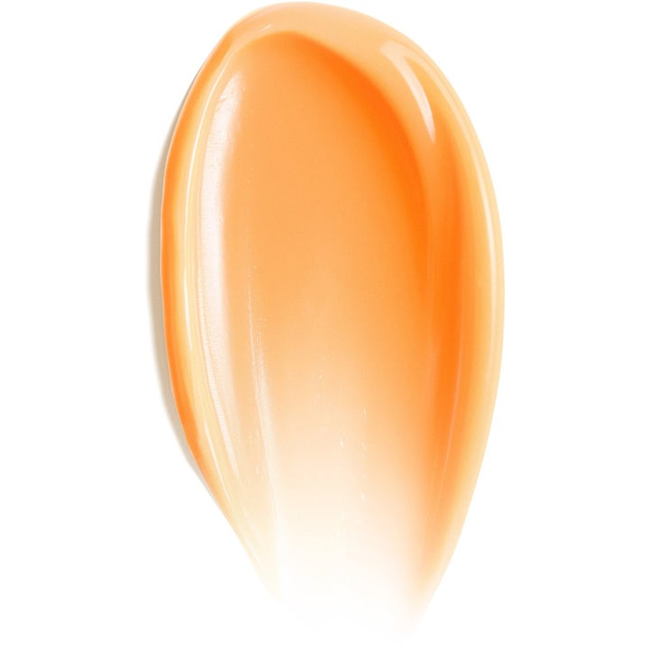 Clinique Superdefense SPF 25 ansiktskräm ger lyster visad som en krämig orange gelkonsistens i ett mjukt svep