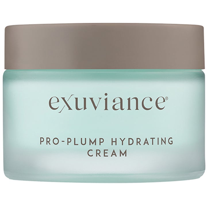 Exuviance Pro-Plump Hydrating Cream återfuktande ansiktskräm i frostad ljusblå glasburk med brunt lock som ger fyllighet.