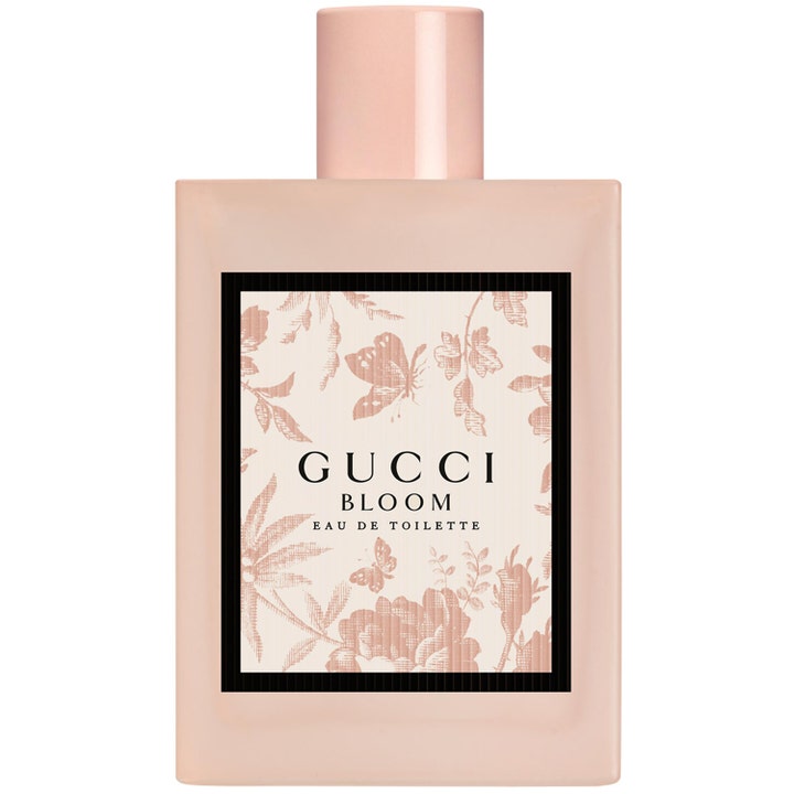 Gucci Bloom Eau de Toilette 100 ml elegant parfym i en ljusrosa fyrkantig glasflaska med blommönstrad etikett och rosa kork