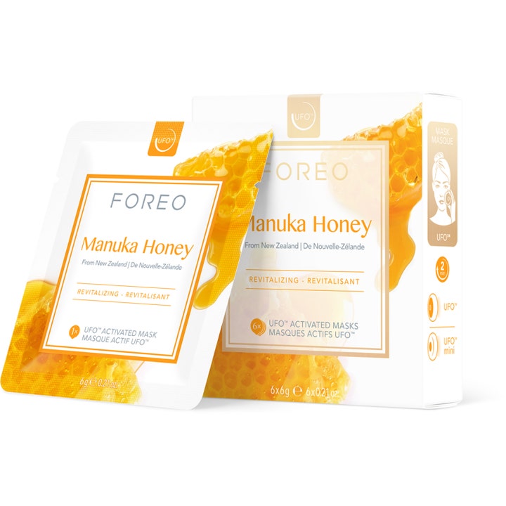FOREO Manuka Honey 6x6g naturlig ansiktsmask med honung i vit förpackning dekorerad med bilder av gyllene honungskakor