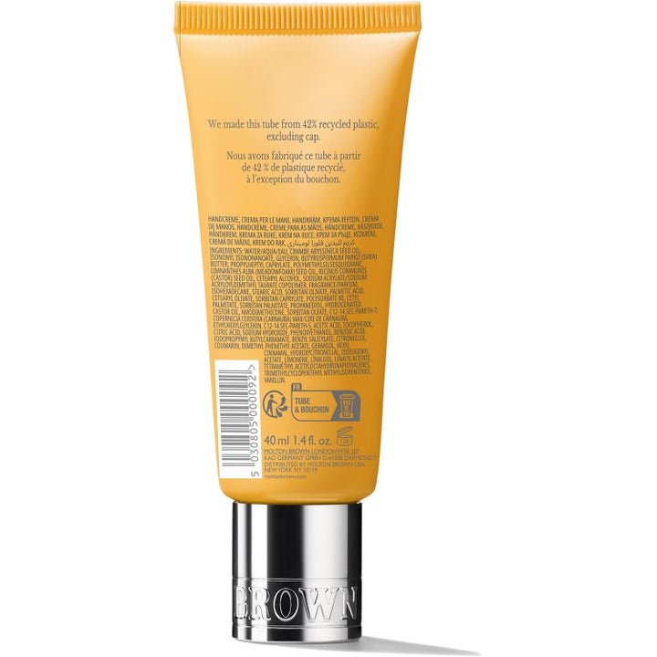 Molton Brown Flora Luminare Hand Cream 40 ml återfuktande handkräm för torr hud i gul tub av återvunnen plast med silverkork