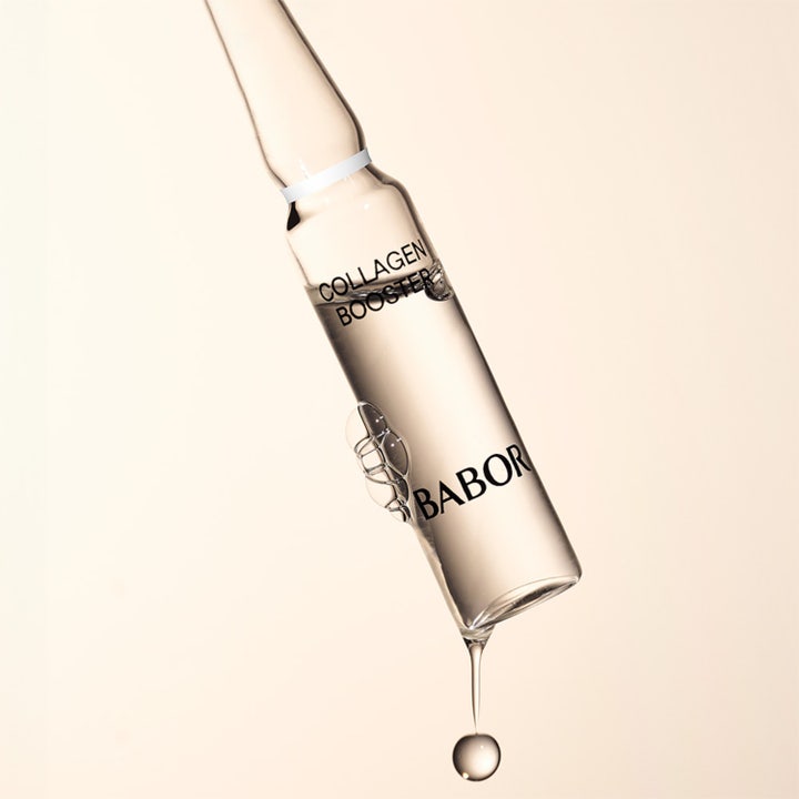 Babor Ampoule Collagen Booster 14 ml ampull ger kollagen för huden i en genomskinlig glasampull med en droppe.