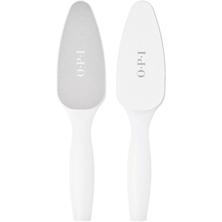 OPI Pro Spa Fotfil för hemmapedikyr ger mjuka fötter och visar två vita verktyg med grå och vit slipyta