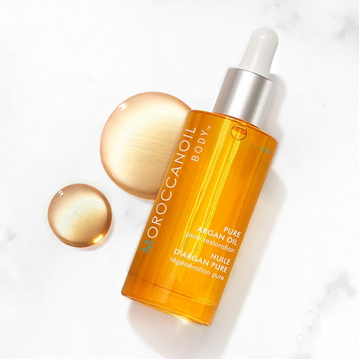 Moroccanoil Pure Argan Oil 50 ml arganolja för torr hud i glasflaska med pipett och gyllene droppar