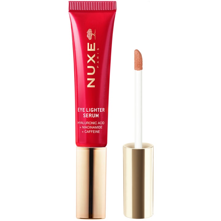 Nuxe Eye Lighter Serum 15 ml lystergivande ögonserum i röd tub med guldkork och mjuk applikator.