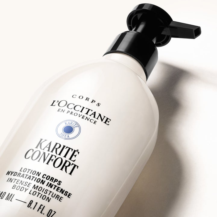 L'Occitane en Provence Shea Butter Body Lotion 240 ml intensivt närande lotion i vit plastflaska med svart pump.