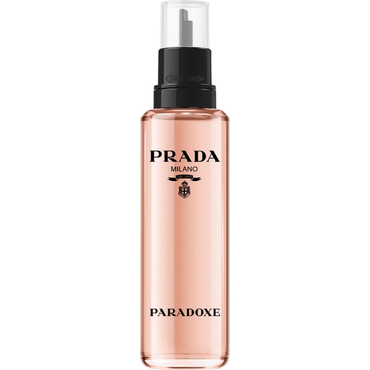 Prada Paradoxe EdP Refill 100 ml prada parfym refill i en hög flaska med rosa vätska och svart munstycke som ger ny parfym
