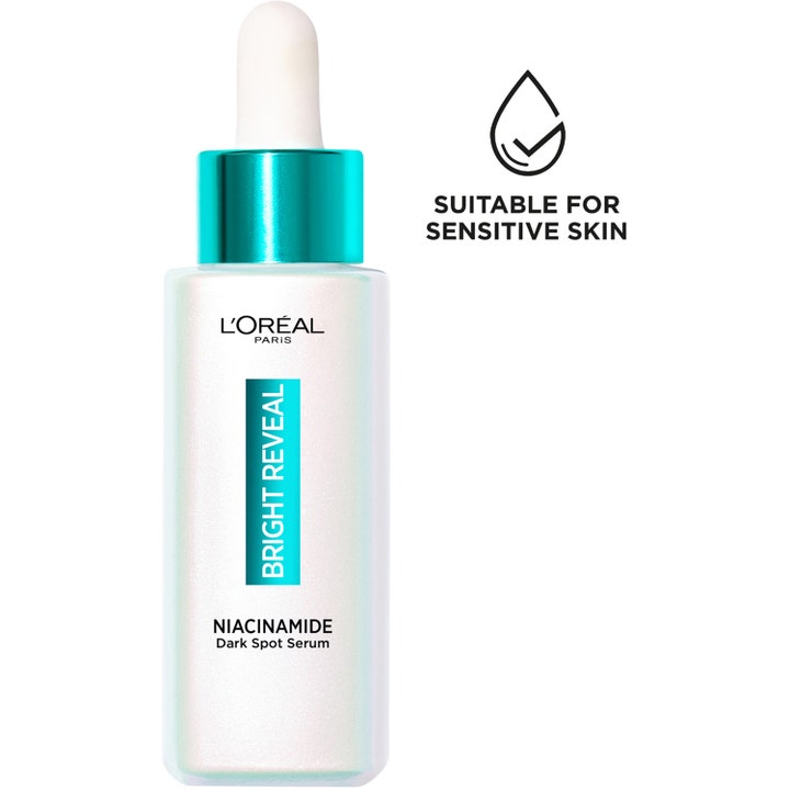 L'Oréal Paris Bright Reveal Niacinamide UV Serum 30 ml ger pigmentreducering i pärlemovit flaska med pipett.