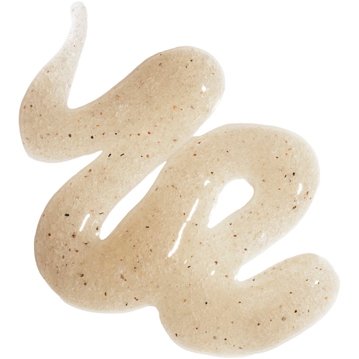 Ole Henriksen Touch Retexturizing Body Scrub 240 g kroppsskrubb med krämig beige textur och små exfolierande korn.