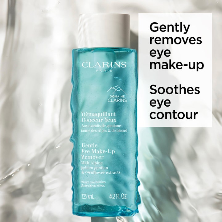 Clarins Gentle Eye Make-Up Remover 125 ml lugnande clarins ögonsminkborttagning för känsliga ögon i blå flaska och vatten