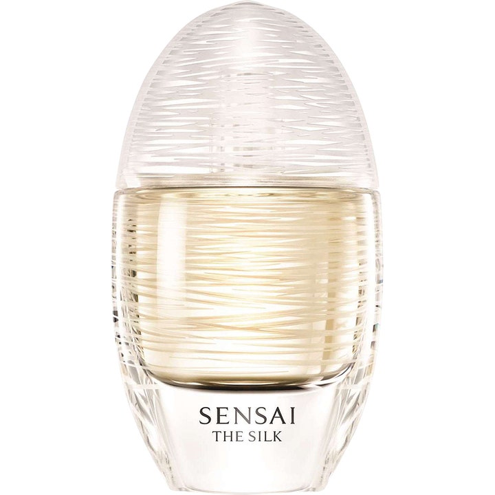 Sensai The Silk Eau de Toilette 50 ml silkeslen parfym i en oval glasflaska med mönster av fina trådar och guldgul vätska