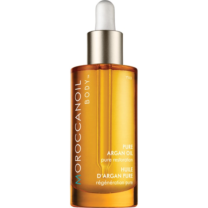 Moroccanoil Pure Argan Oil 50 ml arganolja för torr hud i en bärnstensfärgad glasflaska med silverpipett.