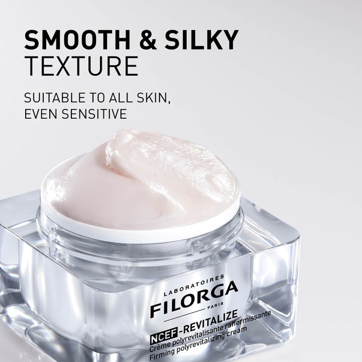 Filorga NCEF-Revitalize Cream 50 ml ansiktskräm med anti age effekt visar en len ljusrosa textur i glasburk