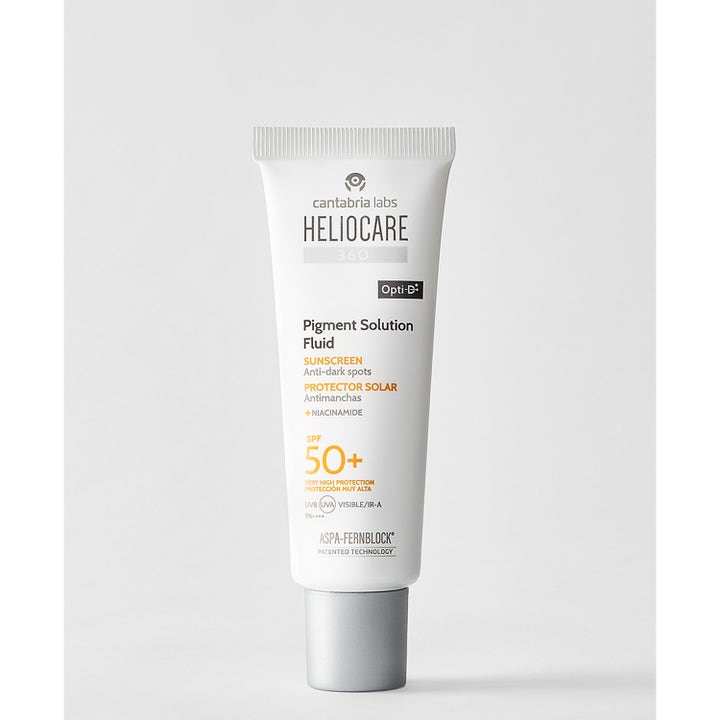 Heliocare Pigment Solution Fluid 50 ml niacinamide anti pigmentfläckar solskydd i vit tub med grått skruvlock