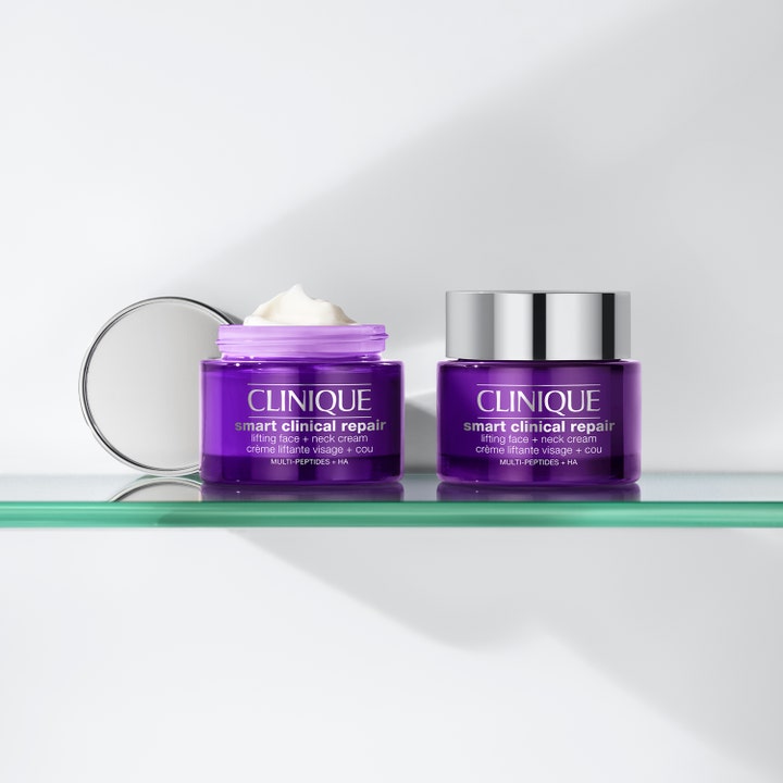 Clinique Smart Clinical Repair 50 ml ansikts och halskräm med peptider i lila glasburk med krämig vit textur.