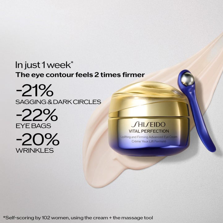 Shiseido Vital Perfection Eye Cream 15 ml mot rynkor i guld- och lila burk med blått massageverktyg.