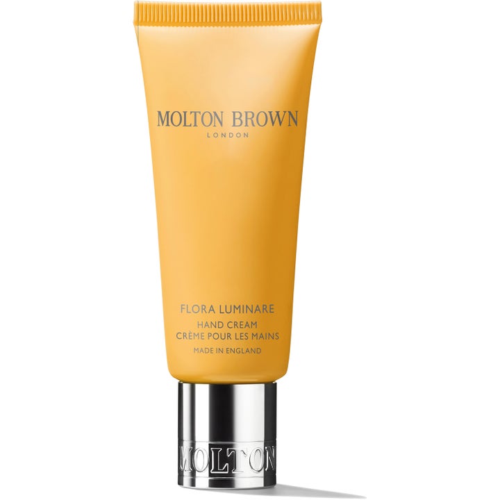 Molton Brown Flora Luminare 40ml återfuktande handkräm för torr hud i gul tub med silverkork blommig parfym
