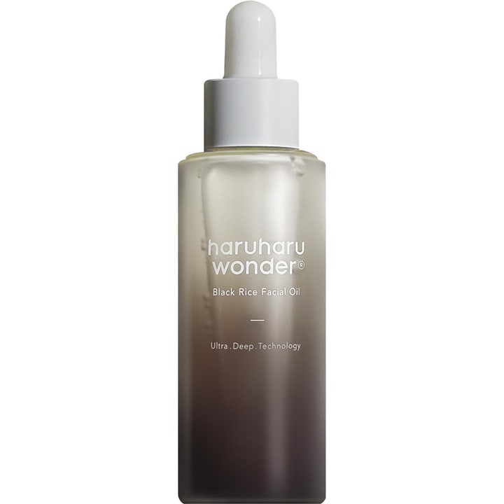 Haruharu Wonder Black Rice Facial Oil 30 ml koreansk naturlig ansiktsolja i en bruntonad gradientflaska med vit pipett