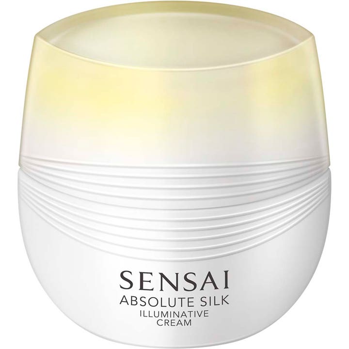 Sensai Absolute Silk Illuminative Cream ansiktskräm för strålande hud i en vit räfflad burk med ljust gult lock