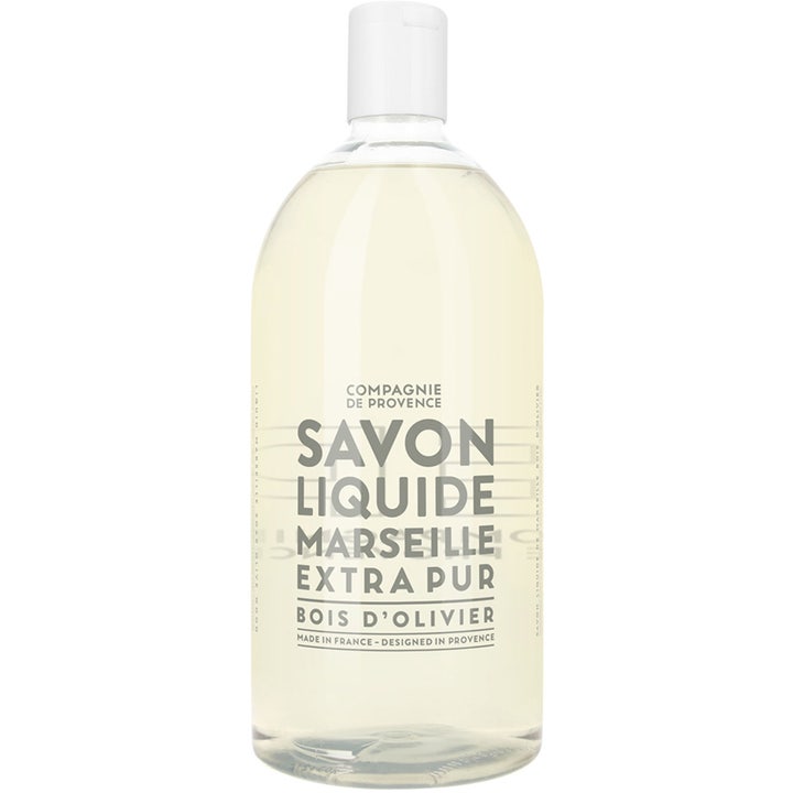 Compagnie de Provence Savon Liquide Marseille Bois d'Olivier 1000ml flytande marseille tvål refill i en klar flaska.