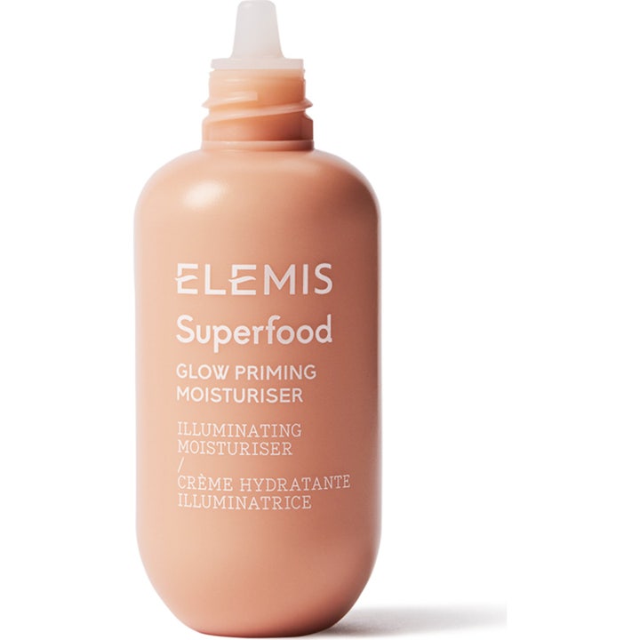 Elemis Superfood Glow Priming Moisturiser återfuktande glowkräm i persikofärgad plastflaska med vitt munstycke.