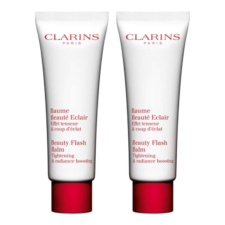 Clarins Beauty Flash Balm ansiktsbalm i vita tuber med röda lock ger huden lyster och en uppstramande effekt.