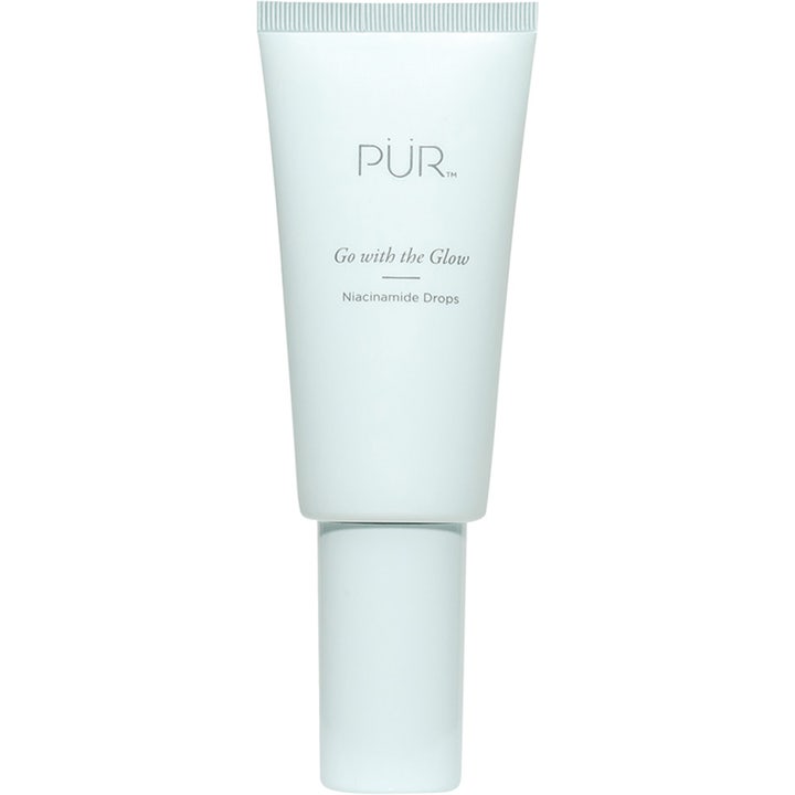 PÜR Go with the Glow Niacinamide Drops är ett lystergivande PÜR ansiktsserum i en ljusblå tub.