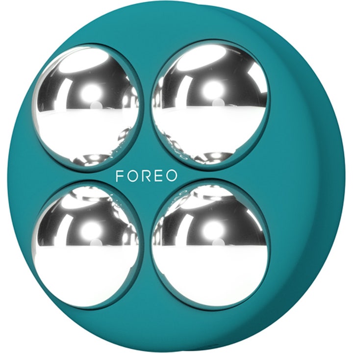 FOREO BEAR 2 body Evergreen 1 st mikroström för toning och huduppstramning med fyra runda silverfärgade massagehuvuden.