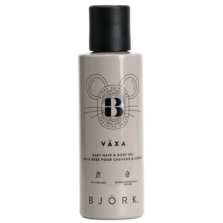 Björk Växa Baby Hair & Body Oil dermatologiskt testad babyolja i grå flaska med svart lock och sött musmotiv.