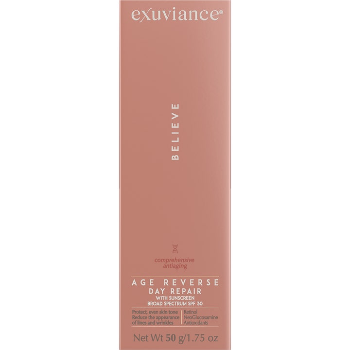 Exuviance Age Reverse Day Repair 50 g antiaging dagkräm med bredspektrum solskydd i roséguldfärgad ask.