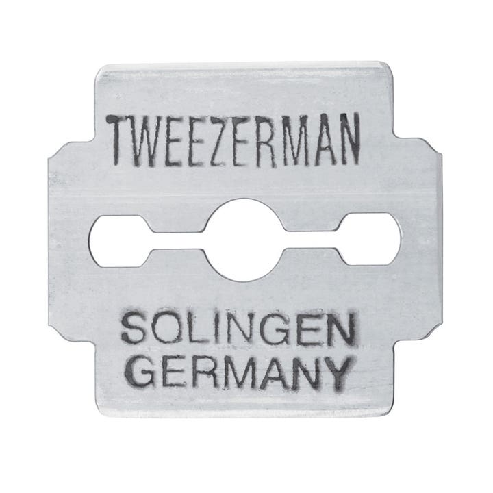 Tweezerman Callus Shaver Blades 20 st fotvård tar bort förhårdnader med ett silverfärgat metallblad märkt Solingen Germany