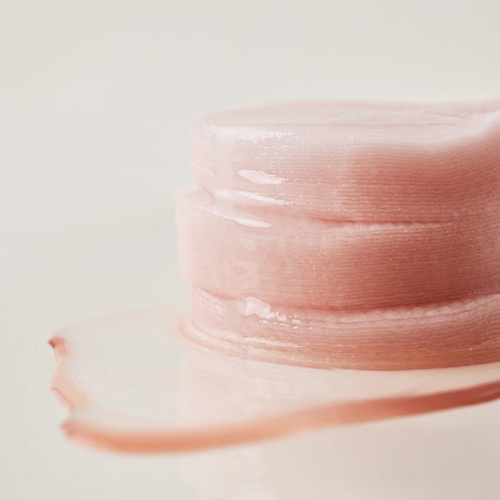 House of Hur Clearing Skin Prep Essence Pad 140 ml hudvård med rosa räfflade pads indränkta i flödande essence.