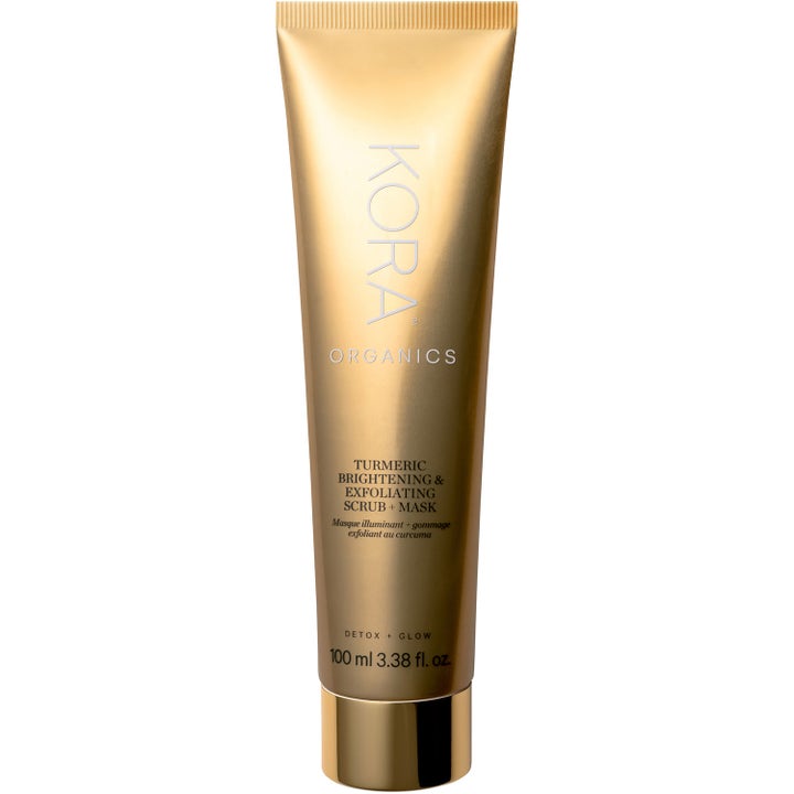 KORA Organics Turmeric Brightening & Exfoliating Mask 100 ml i guldfärgad tub ger huden lyster.