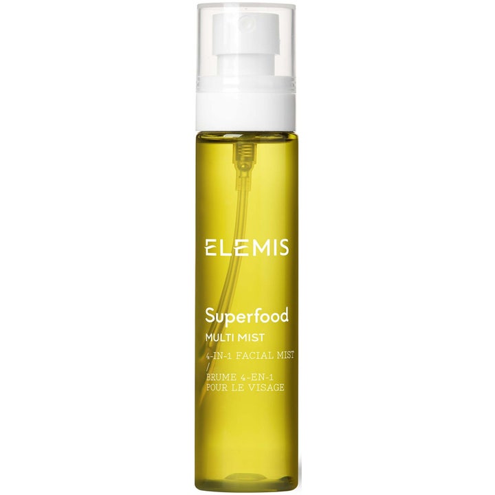 Elemis Superfood Multi Mist 100ml 4-in-1 ansiktsmist som ger lyster i en smal transparent flaska med gyllengul vätska.