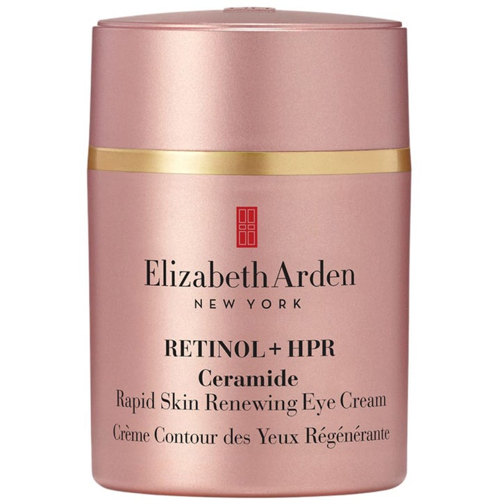 Elizabeth Arden Retinol + HPR Ceramide Rapid Skin Renewing Eye Cream i en skimrande rosa hylsa med gulddetaljer.