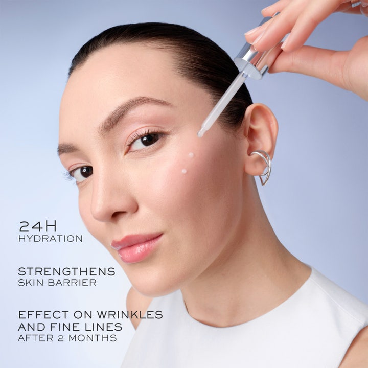 Lancôme Génifique Ultimate 30 ml lyxigt återfuktande serum i svart glasflaska bredvid Advanced Génifique.