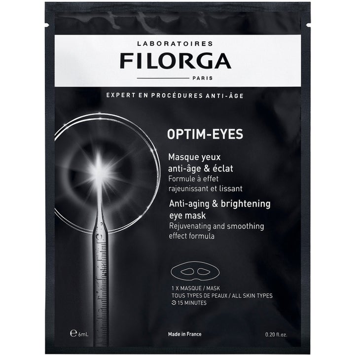 Filorga Optim-Eyes 6 ml ögonmask anti-aging mot påsar i en svart sachet med stilren silvrig design.