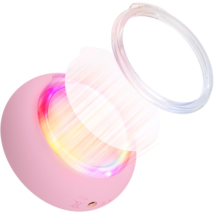 FOREO UFO 3 Pearl Pink 1 st ger ljusterapi med en rosa enhet genomskinlig ring och mask.