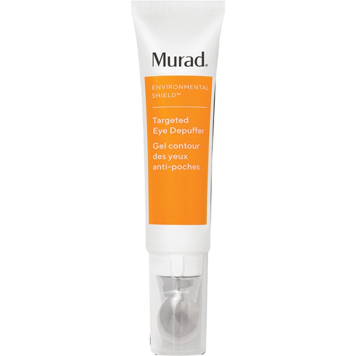 Murad Targeted Eye Depuffer 15 ml ögonkräm mot svullna ögon i vit tub med orange dekor och svalkande metallkula.
